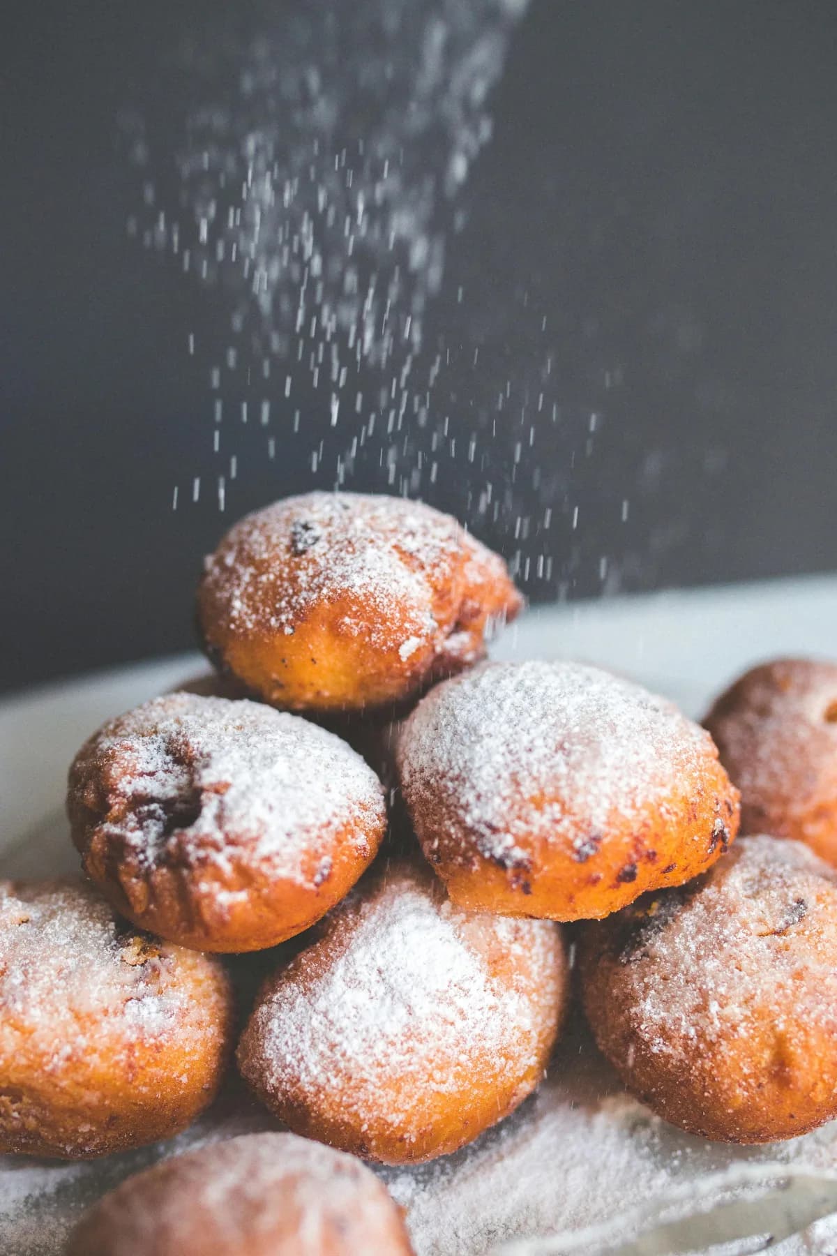 Italian zeppole dusted with sugar