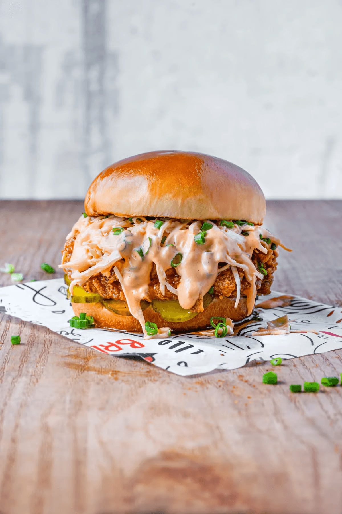 Crispy chicken burger with toppings